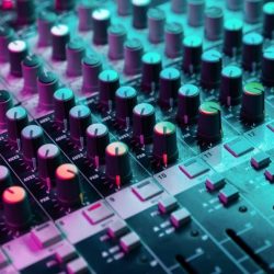 close-up-of-sound-mixing-console-details-of-sound-engineer-room-neon-light_t20_rRj7mZ